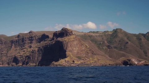 Sailing by boat into the wild islands in south pacific -Marquesas Islands