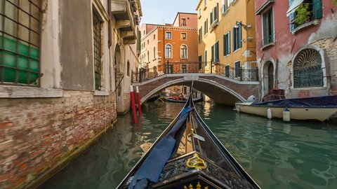 VENICE, ITALY - SEPTEMBER 09, 2016: In gondola on the canals of Venice, Italy