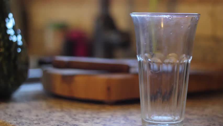 Water Pouring into a Glass
