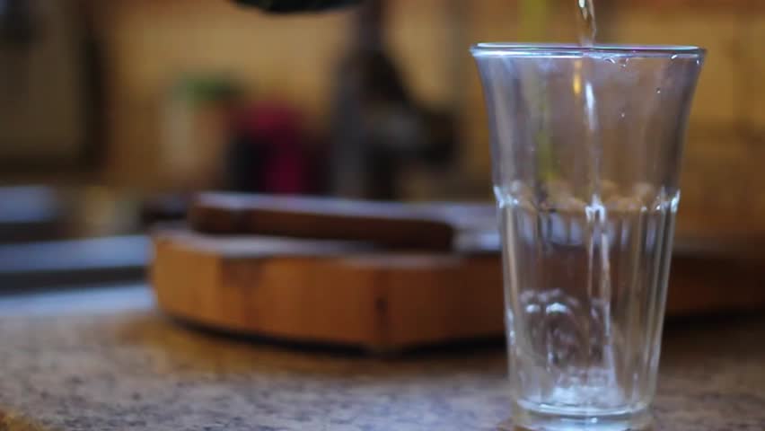 Water Pouring into a Glass - slow motion