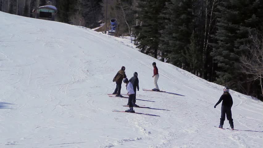 Beginning skiers learning how to ski