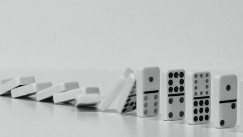 DOMINO EFFECT - white dominoes fall in chain reaction
B/W with plenty room for copy
Fade in & fade out to white
Pan L-R