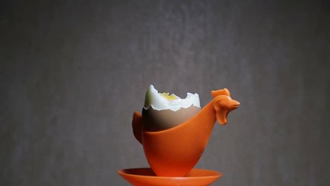 soft-boiled egg in eggcup in a dark