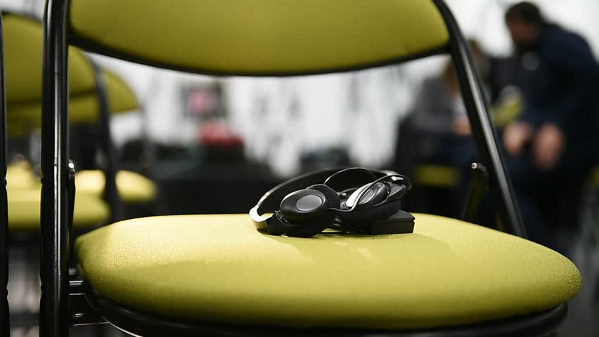Translation headphones on a chair in a conference room