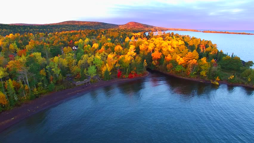 Amazing Autumn scenery, forests with lake, Fall colors, Aerial view.
