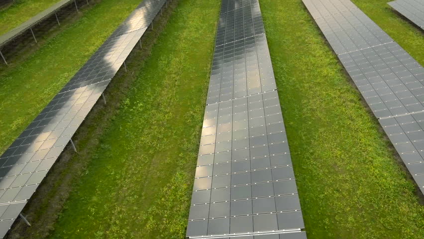 Green energy concept - solar panels panning shot. Aerial view | Shutterstock HD Video #20724727