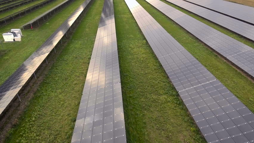 Green energy concept - solar panels straight forward shot. Aerial view | Shutterstock HD Video #20724733