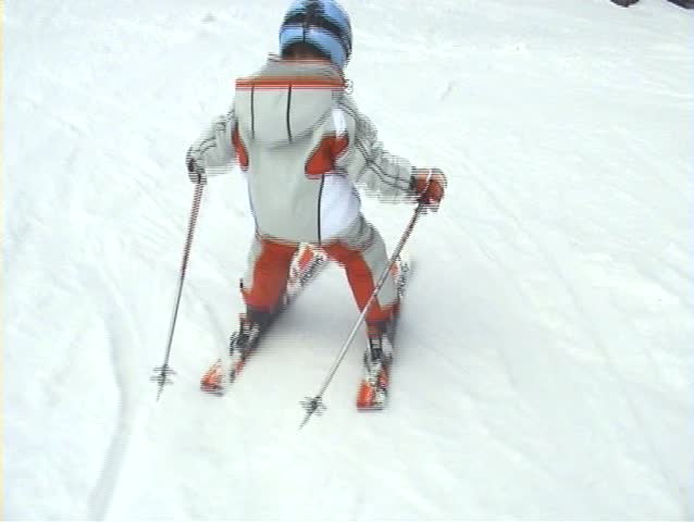 Child in action, slalom