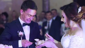 New young couple eat the cake - Powered by Shutterstock - Get 15% off with code: PIKWIZARD15