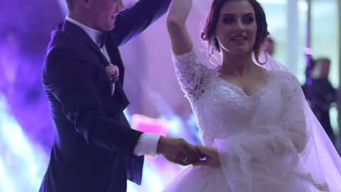 Just married couple is dancing at wedding party