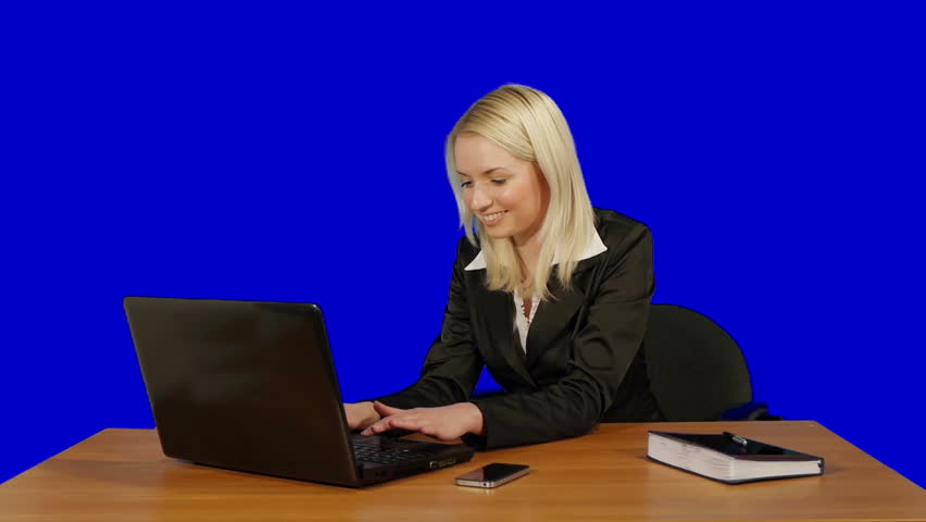 blonde businesswoman working with computer