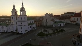 Aerial footage of an orthodox church at beautiful sunset