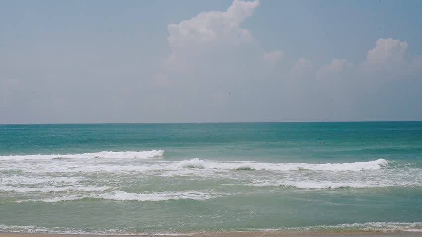 waves landing on sandy beach Stockvideoklipp (helt royaltyfria) 20752555 Sh...