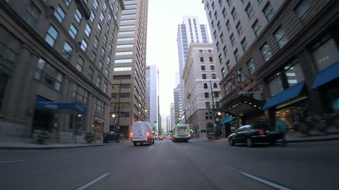 Denver, Colorado, USA-October 22, 2016. POV point of view - Driving through downtown Denver early in the morning.
