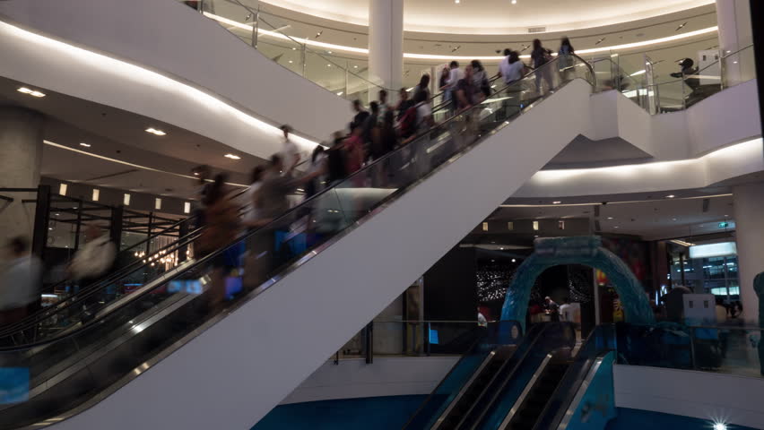 Timelapse shot of shopping mall customers riding up and down escalators | Shutterstock HD Video #20804314