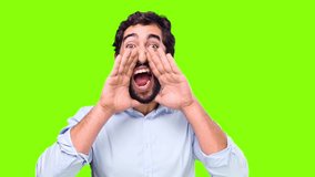 young crazy man shouting on chroma key background
