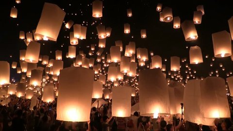 Amazing Yee Peng and Loy Krathong Festival of Floating Lights and Sky lanterns at Mae Jo, Chiang Mai, Thailand. Slow Motion.