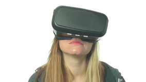 Woman watches computer code through Virtual Reality goggles