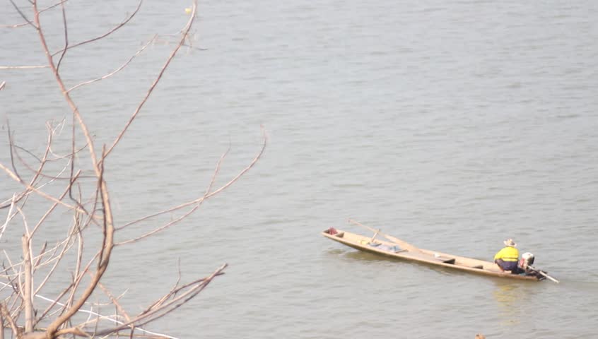 Fisher boats swimming on a Mekong river, Thailand.