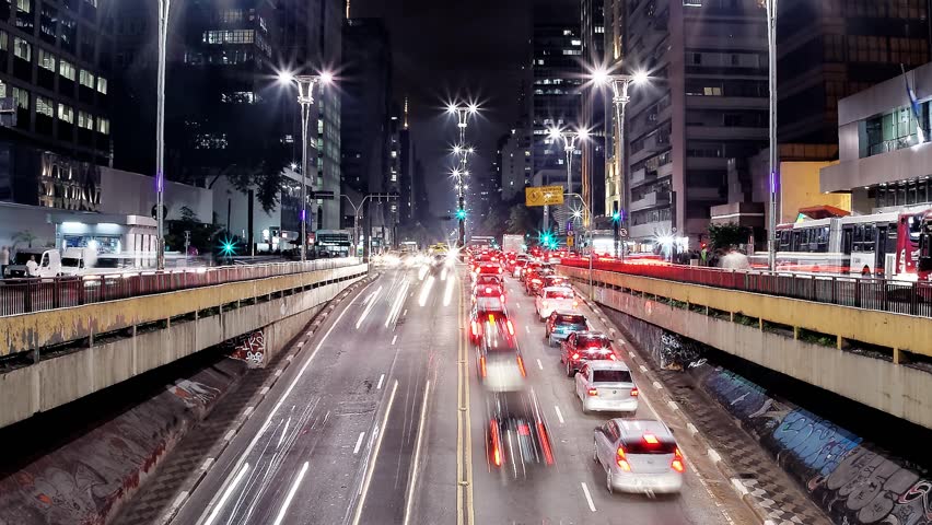 People hurry back home during rush hour on Avenida Paulista. Sao Paulo, Brazil, low view