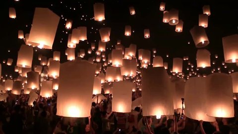 Amazing Yee Peng and Loy Krathong Festival of Floating Lights and Sky lanterns at Mae Jo, Chiang Mai, Thailand. Slow Motion.