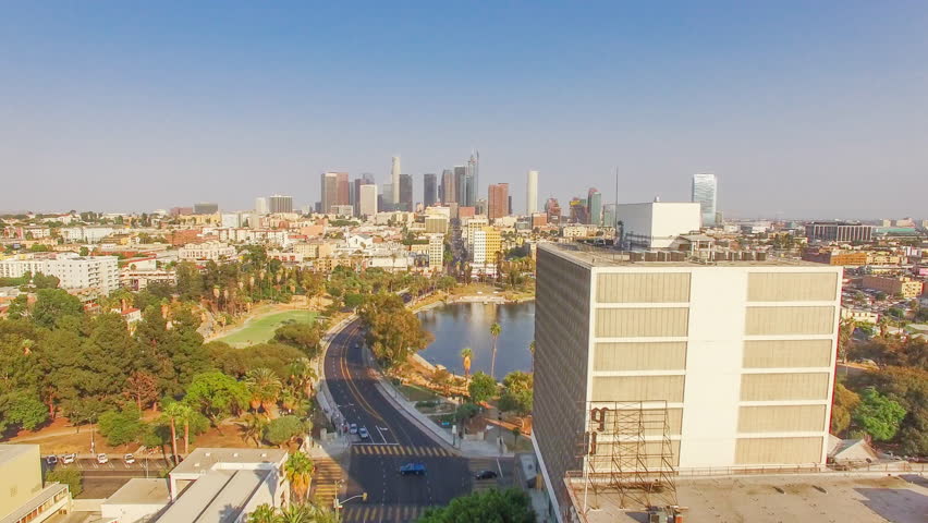 4K UHD aerial hyperlapse view shot flying left and looking towards skyscrapers of Downtown, Los Angeles, California. 