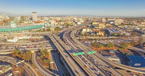 4K UHD aerial hyperlapse view shot flying over heavy traffic on 10 freeway in Downtown, Los Angeles, California. 