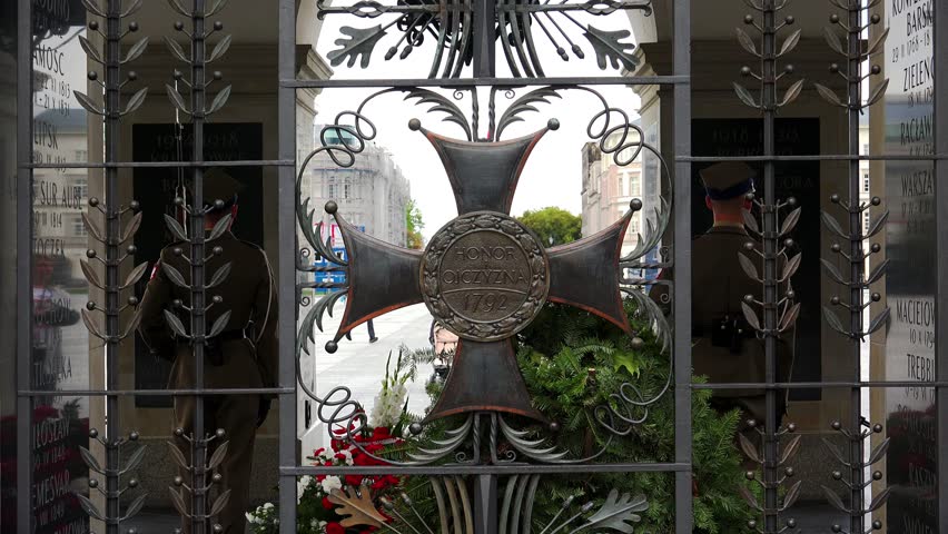 Honorary Guards on Duty next to the Tomb of the Unkown Soldier on Pilsudski Square, Warsaw. Poland. Shot in 4K (ultra-high definition (UHD)).