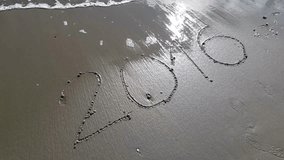 2016 written on sand that is erased by the waves