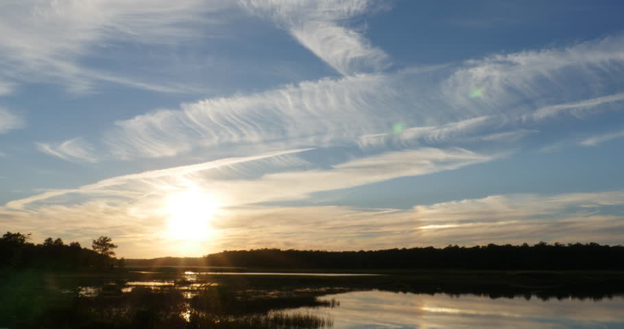 Sunset with Silky Smooth Clouds Over Crystal Lake Wide View, 4K