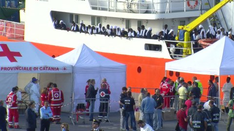 CATANIA, SICILY/ITALY â?? OCTOBER 16: Migrant crisis in the port of Catania, the vessel SOS Mediterranee NGO of MSF named Acquarius has  disembarked 126 migrants from Africa on 2016 in CATANIA. 