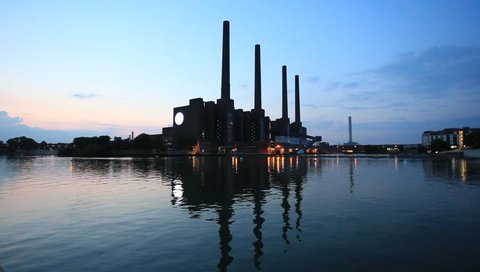 WOLFSBURG, GERMANY - SEP 23, 2016: View of the old Volkswagen factory buildings illuminated at night
