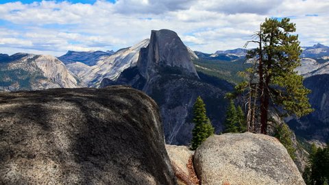 Time Lapse of clouds and shadows moving across Half Dome and the Yosemite Valley in Yosemite National Park.