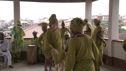 Lagos, Nigeria - August 2013; Drummers and dancers perform at Orisha initiation ceremony.