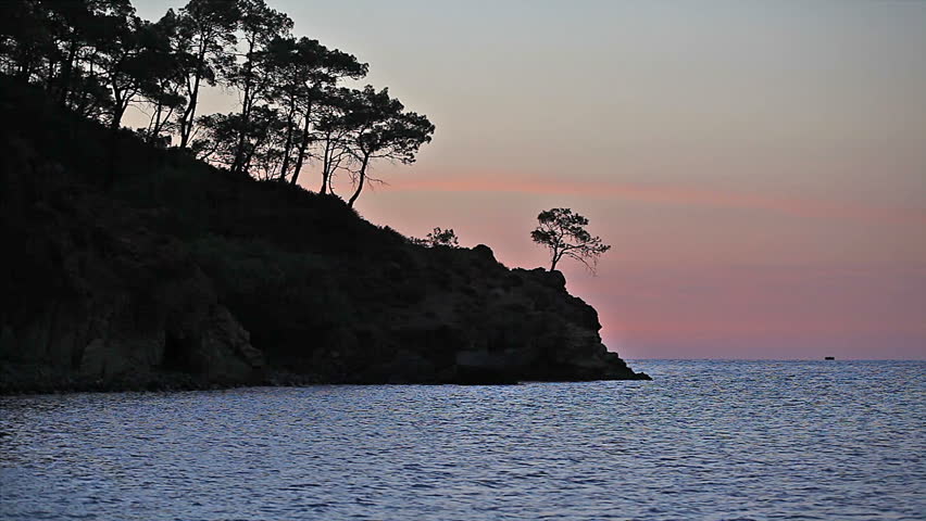 scenic sunrise background sun rising. timelapse of sun rising behing sea and mountains