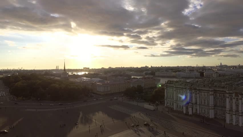Russia, Saint-Petersburg, 19 September 2016: Aerial view of Palace Square and Alexander Column at sunset, a gold dome of St. Isaac's Cathedral, the Winter Palace, the Hermitage, little people walks | Shutterstock HD Video #20933701