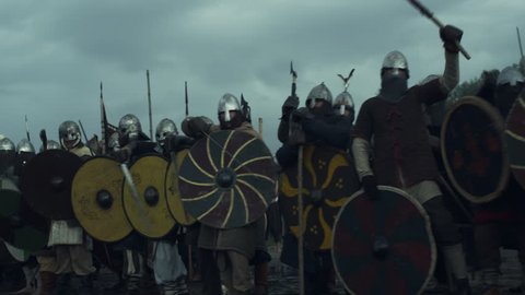 Army of Vikings Before Battle. Medieval Reenactment. Shot on RED Cinema Camera in 4K (UHD).