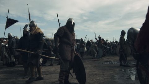 Walking Crowd of Medieval Warriors during Rest Between Battles. Medieval Reenactment. Shot on RED Cinema Camera in 4K (UHD).