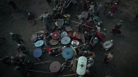 WOLIN, POLAND - 06.08.2016: Flying over the Battlefield where Medieval Warriors Fighting. Slavs and Vikings Festival.Medieval Reenactment. Shot on RED Cinema Camera in 4K (UHD).