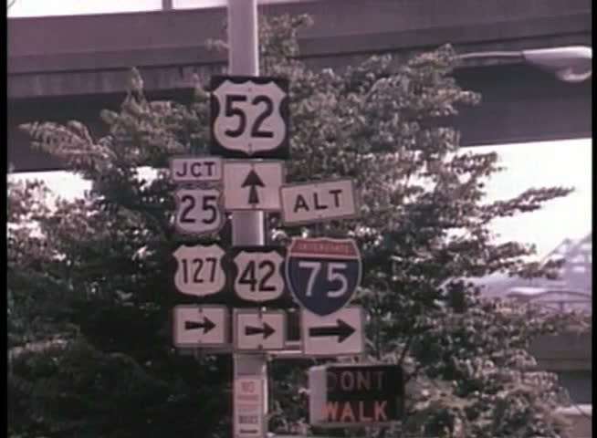 Wide shot of street signs in Cincinnati, Ohio
