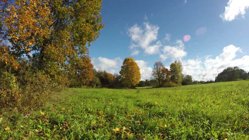 Clouds moving over autumnal fields, 4K time lapse