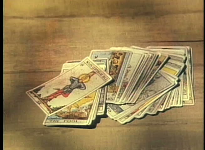 Close-up of male hands picking up deck of tarot cards Royalty-Free Stock Footage #2096741