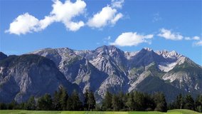 Time Lapse of Alps Mountains in Sunny Day, Austria. Full HD 1920x1080 Video Clip