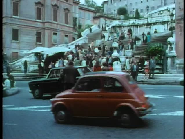 Wide shot of people milling around Spanish Steps, Rome, Italy
