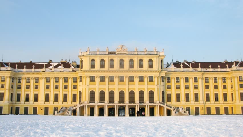 Palace stands shined by beams of sunset, time lapse