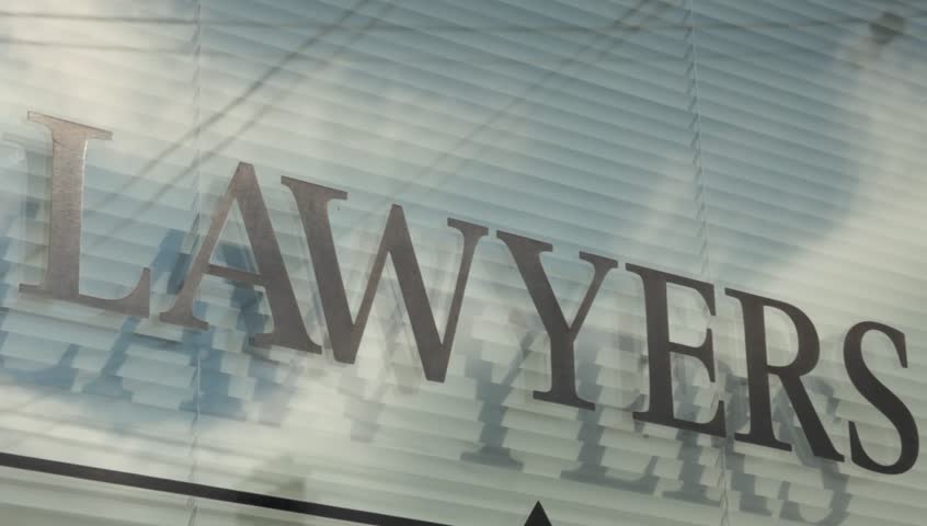 Lawyers sign with shadows close up Royalty-Free Stock Footage #20985436