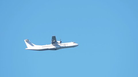 HD - Turboprop airliner in the sky