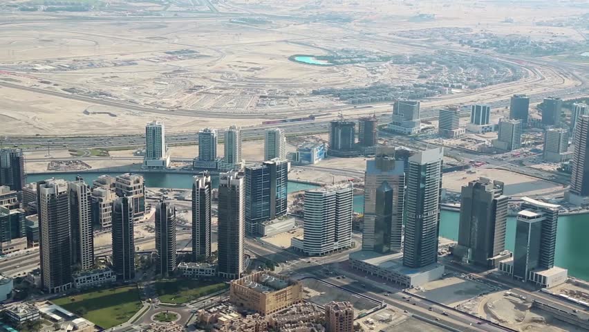 Dubai downtown, United Arab Emirates. View from the 124th floor of Burj Khalifa skyscraper in Dubai. At the top - Burj Khalifa. Dubai is a city and emirate in UAE