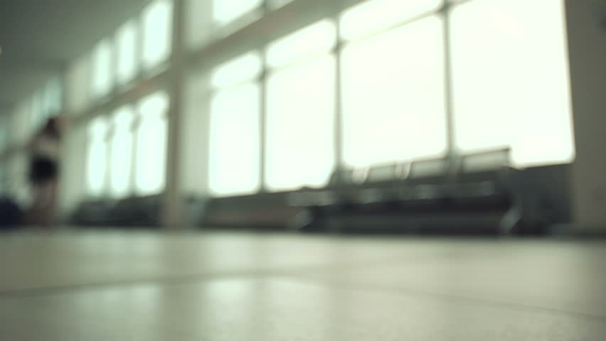 Blur motion of passengers walking at airport