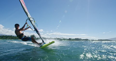 Windsurfer gets big air jumping off wave, Extreme sport Stock video